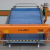 Самохідний електричний гусеничний комбайн для збору салатів Ortomec Herbex